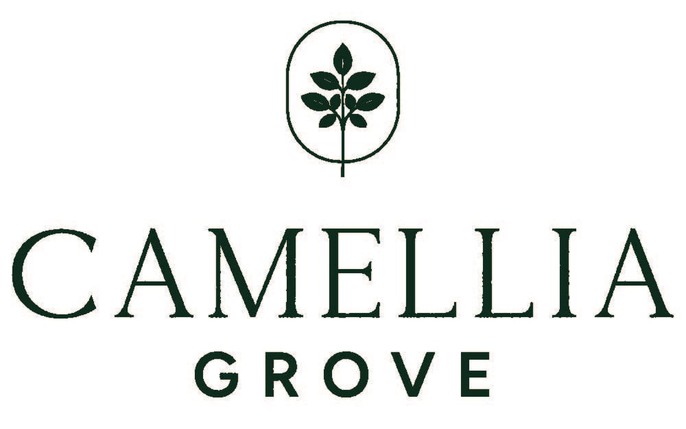A logo with a leaf in a circle and the words "CAMELLIA GROVE" below it.